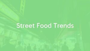 Busy street food market at night, vibrant stalls with diverse cuisines, lively crowd, warm glowing lights, realistic.