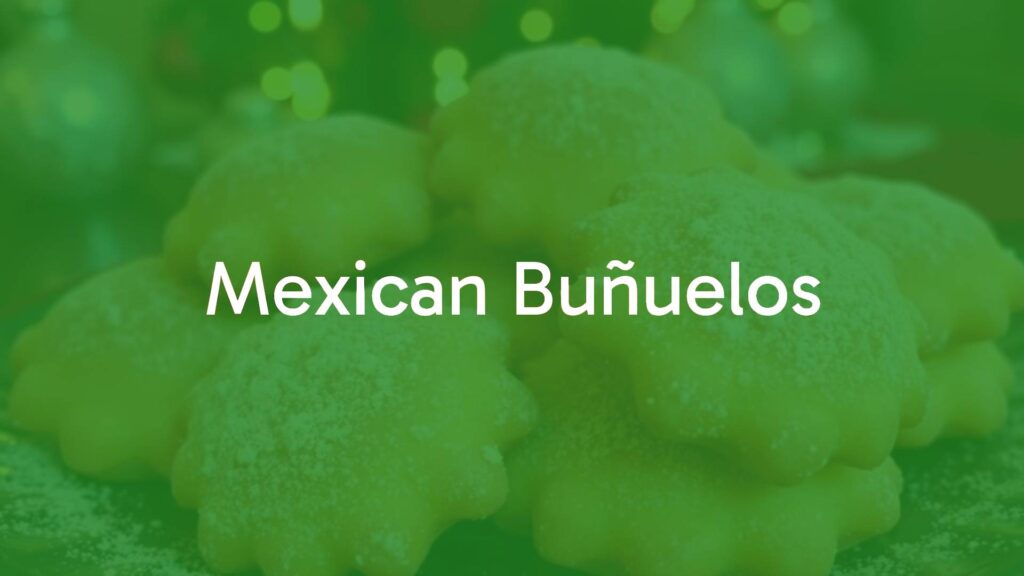 Golden-brown crispy Mexican buñuelos sprinkled with cinnamon sugar, traditional holiday dessert, festive mood, warm lighting.